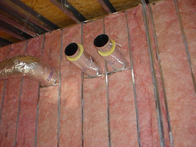 Unsealed Ductwork in Pink Insulation